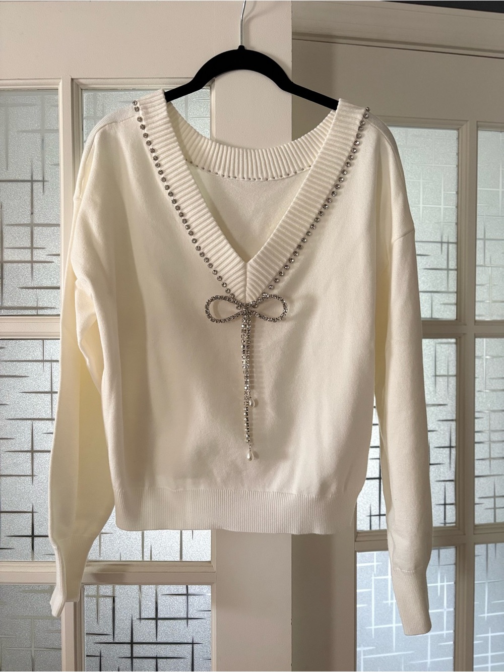 Women's Cream V-Neck Sweater with Rhinestone Bow